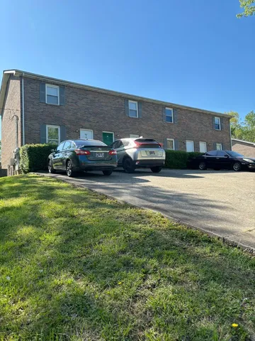 a car parked in front of a building