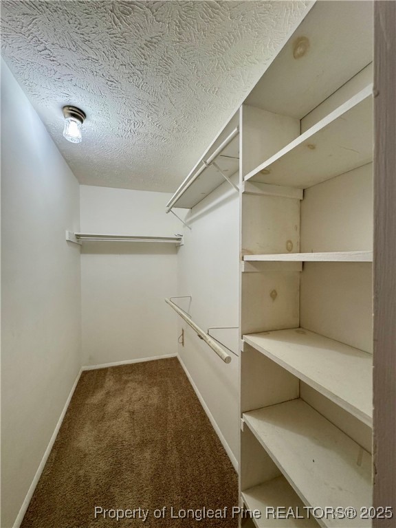 1899 Tryon Drive, Unit 8 Fayetteville, NC 28303 - Photo 13 of 21 a view of a room with rack on the wall