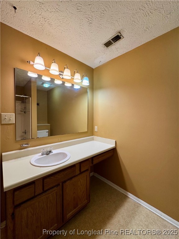 1899 Tryon Drive, Unit 8 Fayetteville, NC 28303 - Photo 15 of 21 a bathroom with a sink a vanity and a mirror