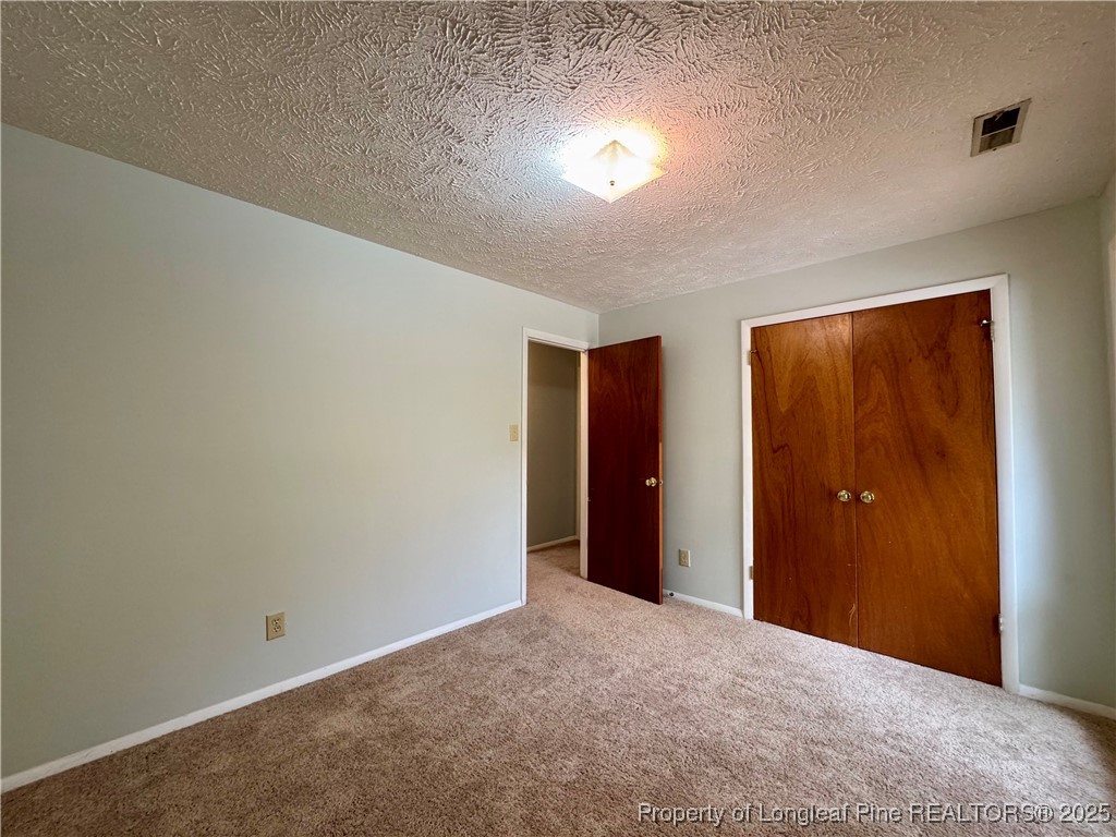1899 Tryon Drive, Unit 8 Fayetteville, NC 28303 - Photo 17 of 21 a view of an empty room