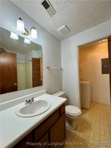 a bathroom with a sink a mirror and a bathtub