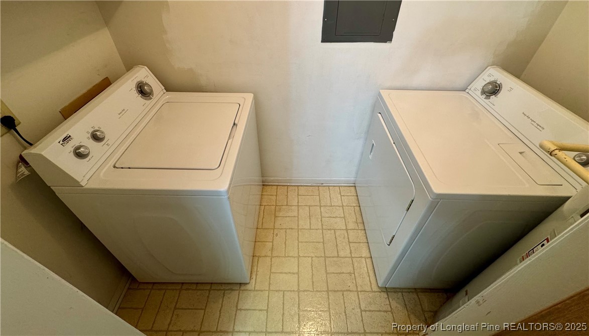 1899 Tryon Drive, Unit 8 Fayetteville, NC 28303 - Photo 20 of 21 a utility room with dryer and washer