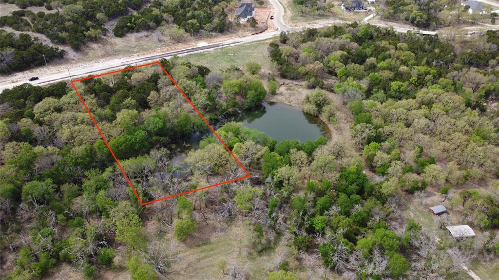 1045 Creek Crossing Road Nemo, TX 76070 - Photo 10 of 15 view of a forest with a houses