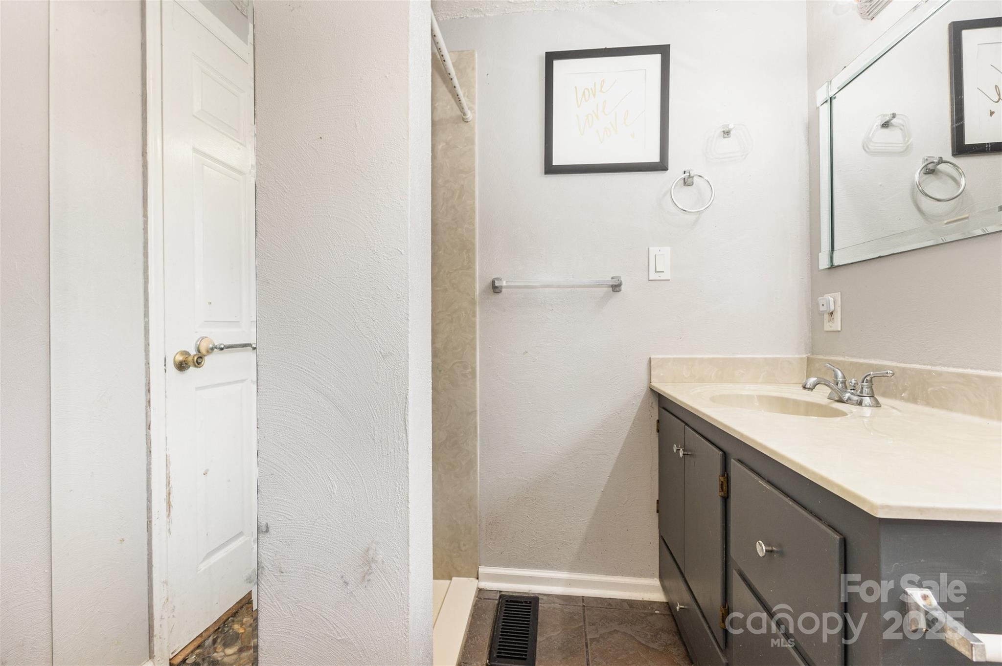 281 South Sutton Road Fort Mill, SC 29708 - Photo 15 of 21 a bathroom with a sink and a mirror