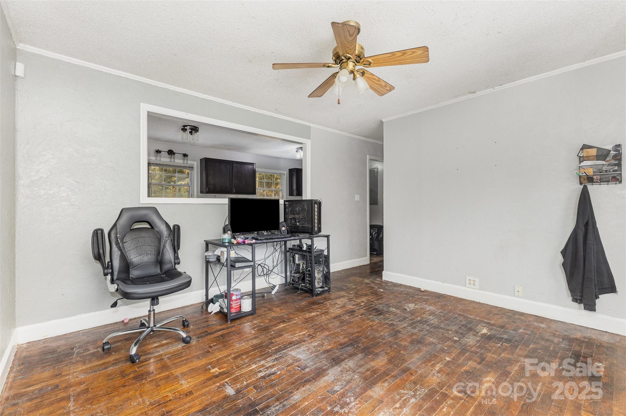 281 South Sutton Road Fort Mill, SC 29708 - Photo 4 of 21 a workspace with furniture and wooden floor