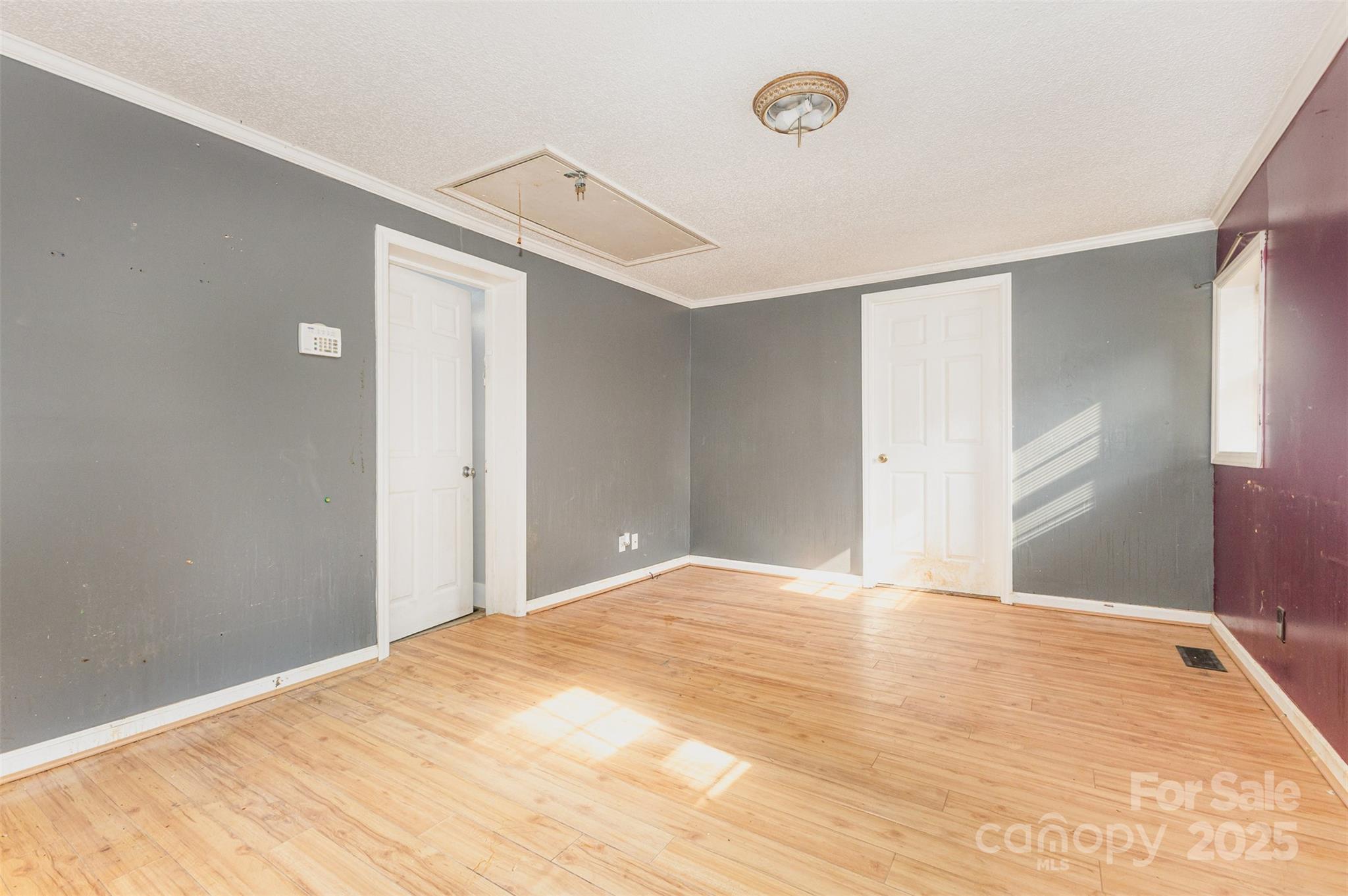 281 South Sutton Road Fort Mill, SC 29708 - Photo 10 of 21 a view of empty room with wooden floor