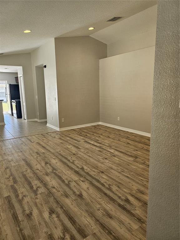 21332 Morning Mist Way Land O Lakes, FL 34637 - Photo 15 of 25 a view of a livingroom with wooden floor
