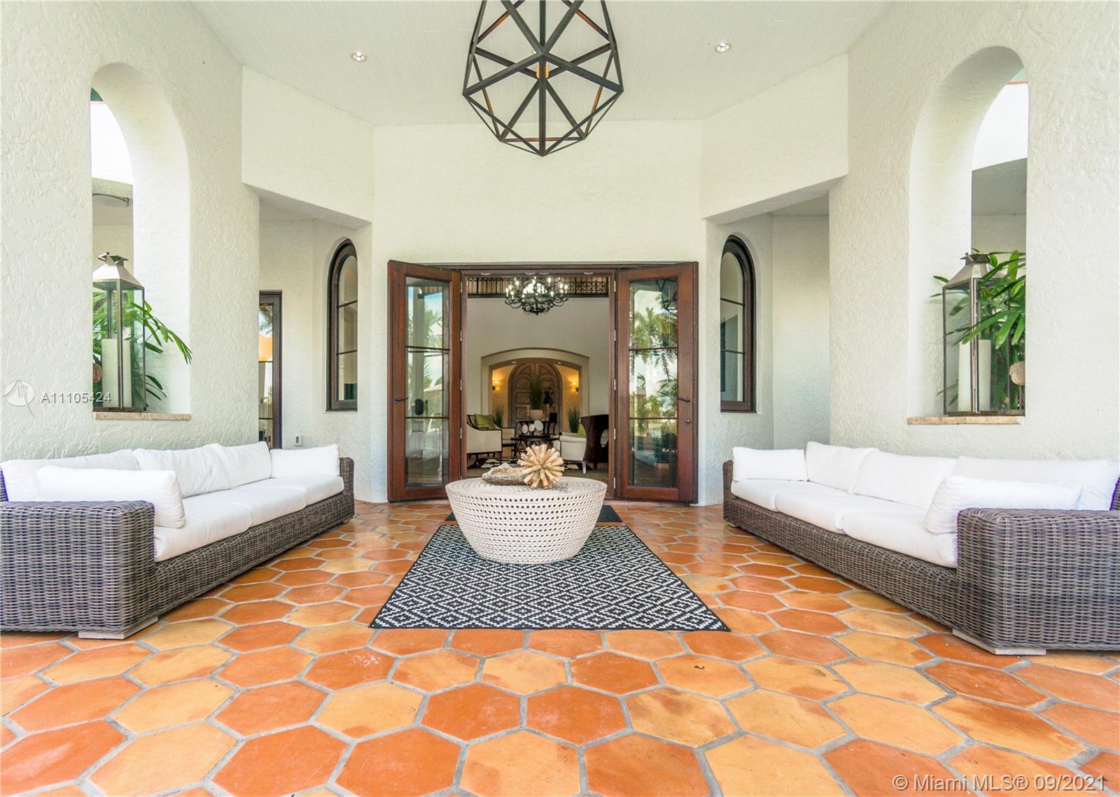 1201 Northeast 83rd Street Miami, FL 33138 - Photo 20 of 65 a living room with furniture and a large window