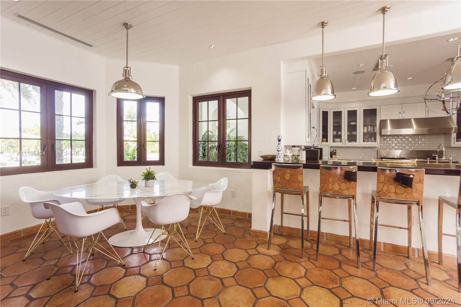1201 Northeast 83rd Street Miami, FL 33138 - Photo 27 of 65 a view of a dining room with furniture