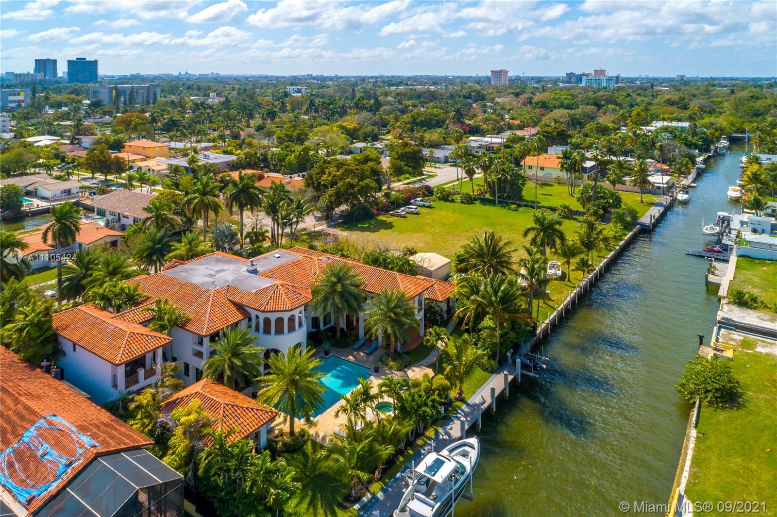 1201 Northeast 83rd Street Miami, FL 33138 - Photo 4 of 65 an aerial view of residential houses with outdoor space