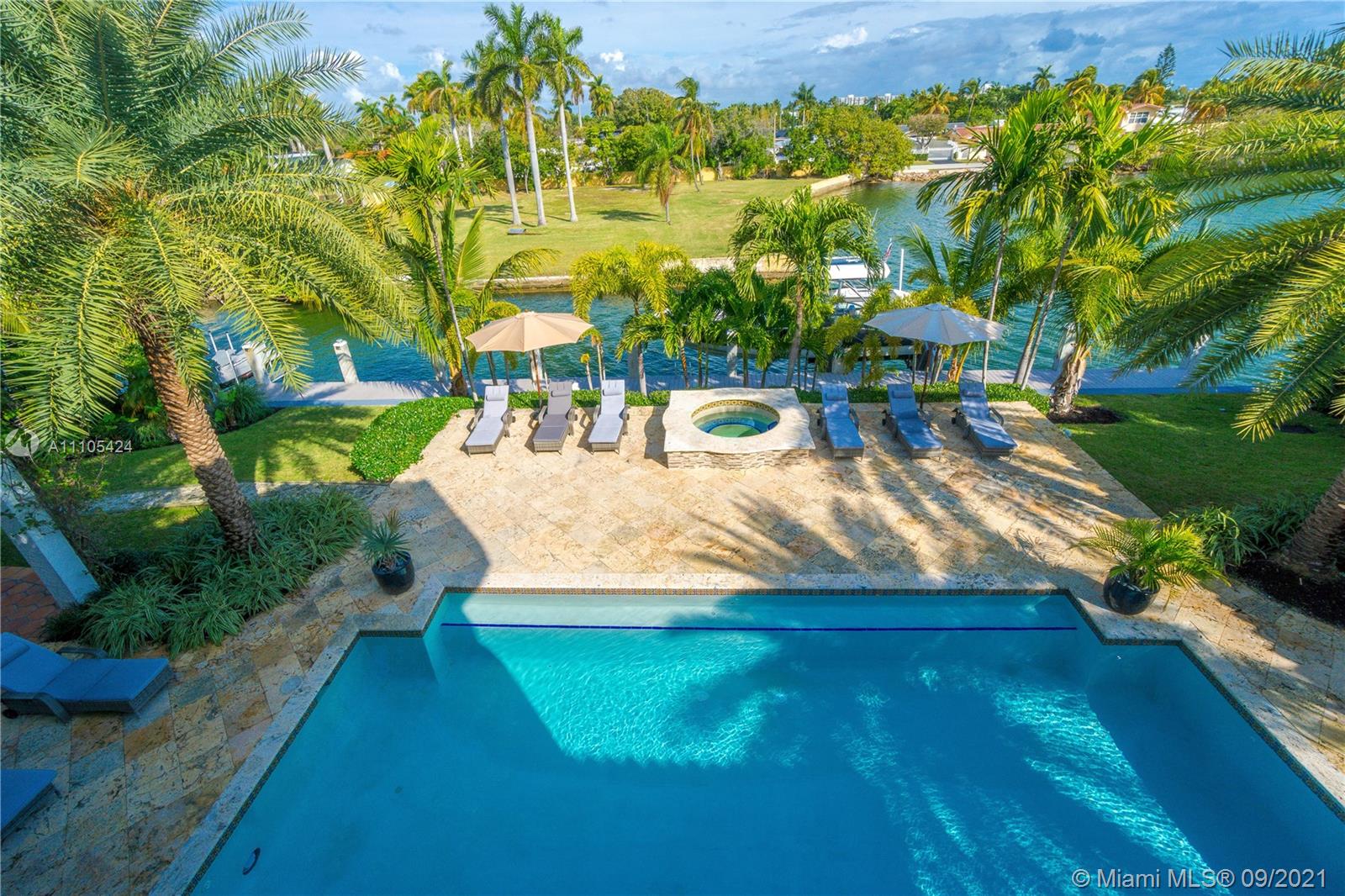 1201 Northeast 83rd Street Miami, FL 33138 - Photo 40 of 65 a view of a yard with an outdoor seating
