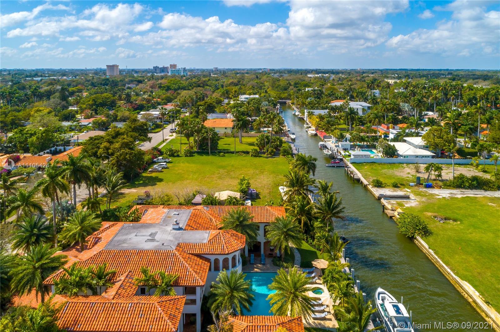 1201 Northeast 83rd Street Miami, FL 33138 - Photo 5 of 65 an aerial view of residential houses with outdoor space