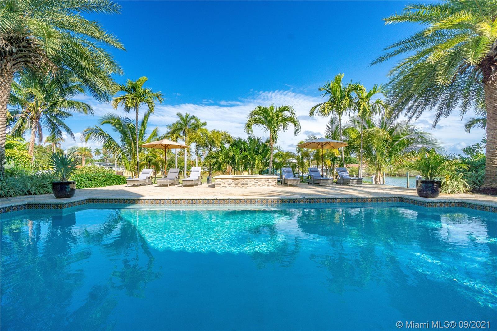 1201 Northeast 83rd Street Miami, FL 33138 - Photo 42 of 65 a view of swimming pool with a garden
