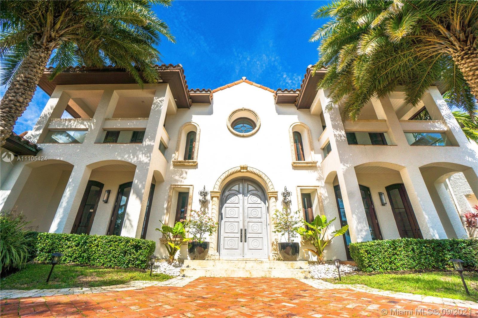 1201 Northeast 83rd Street Miami, FL 33138 - Photo 46 of 65 a front view of a house with a yard