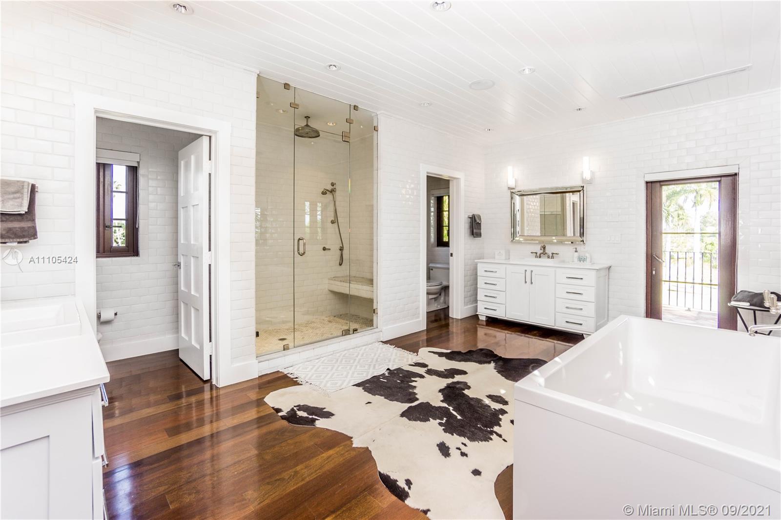 1201 Northeast 83rd Street Miami, FL 33138 - Photo 63 of 65 a bed room with a bed furniture and a window