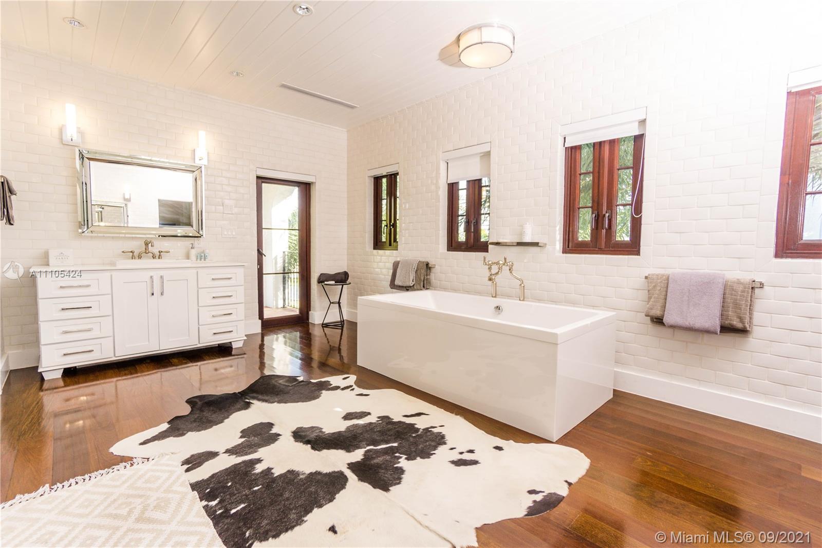 1201 Northeast 83rd Street Miami, FL 33138 - Photo 64 of 65 a bathroom with a sink and a bathtub