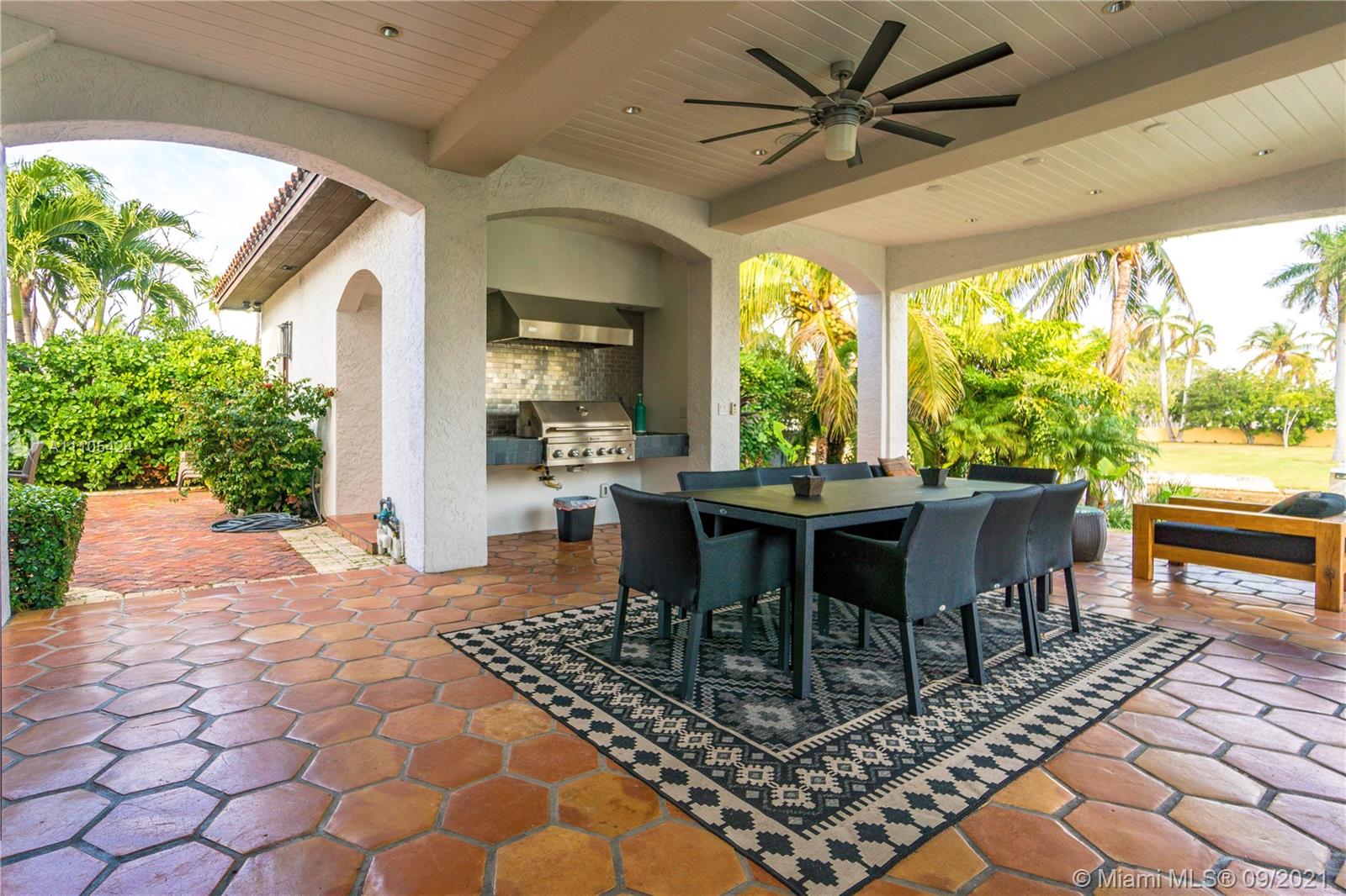 1201 Northeast 83rd Street Miami, FL 33138 - Photo 9 of 65 a outdoor dining space with furniture