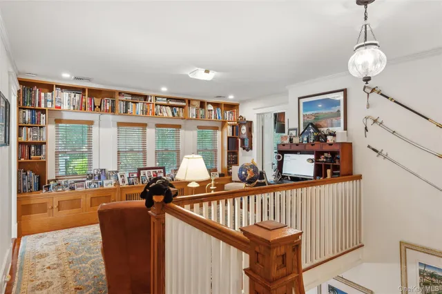 a view of a living room and a balcony