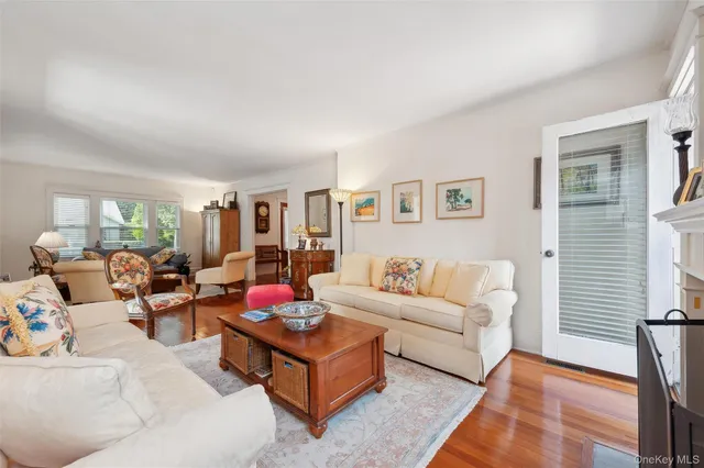 a living room with furniture or couch and a window