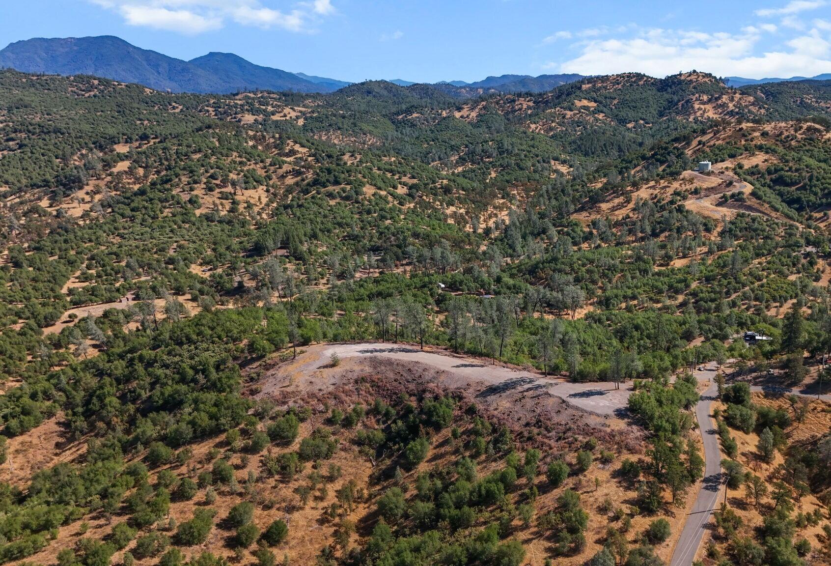 a view of an outdoor space and mountains
