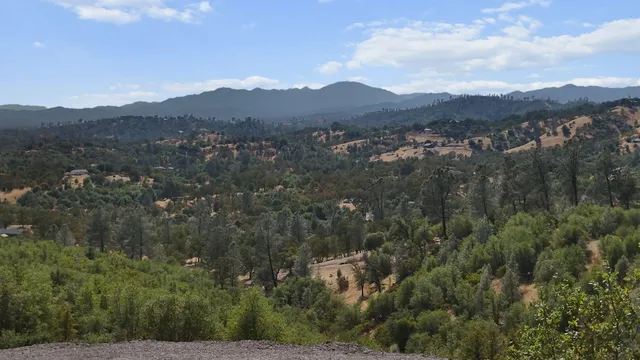 a view of a city with mountain