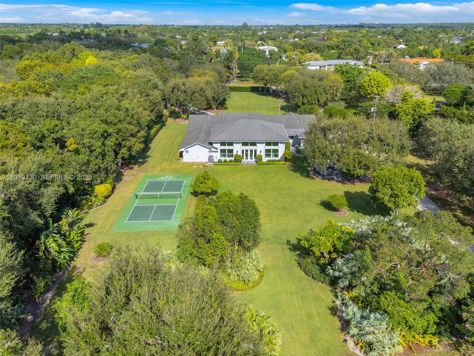 18000 Southwest 288th Street Homestead, FL 33030 - Photo 7 of 10 a view of a yard with an outdoor space