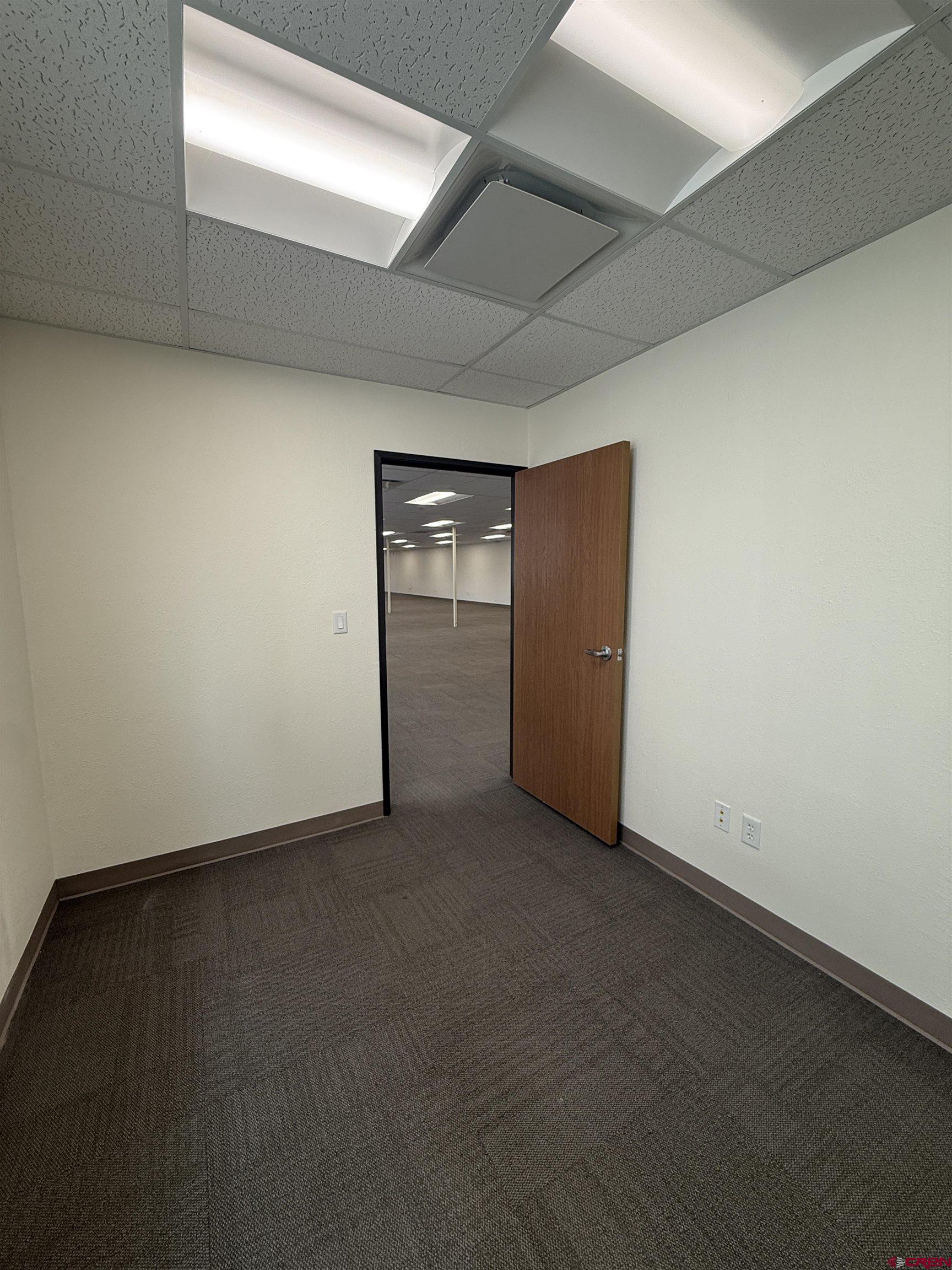 675 Industrial Boulevard, Unit 103 AND GARAGE Delta, CO 81416 - Photo 15 of 31 an empty room with closet area