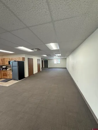 a view of a hallway with an empty room