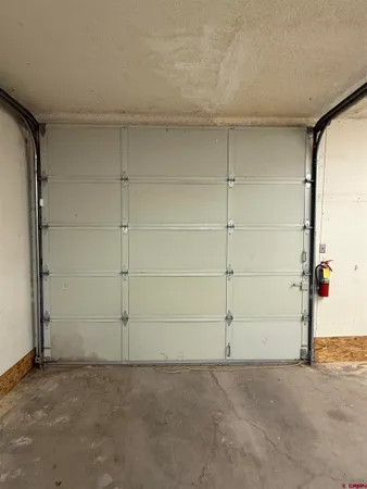 a view of a wooden door and an outdoor space