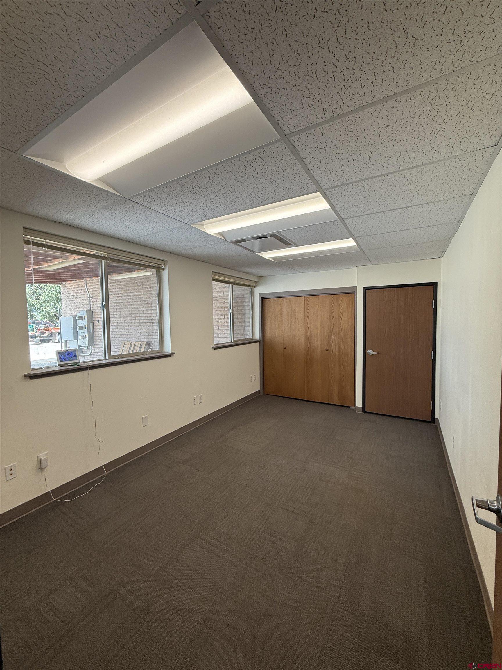 675 Industrial Boulevard, Unit 103 AND GARAGE Delta, CO 81416 - Photo 8 of 31 a view of an empty room with a window