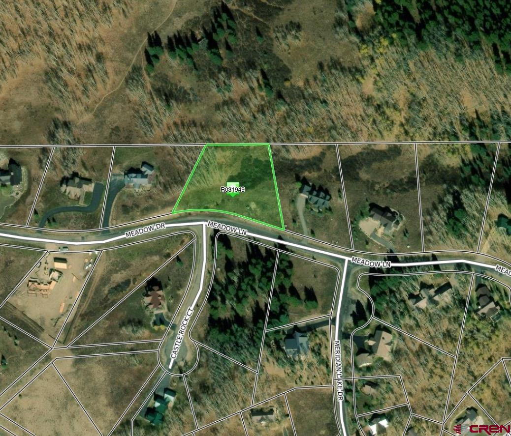 555 Meadow Drive Crested Butte, CO 81224 - Photo 24 of 24 a view of a yard with table and chairs