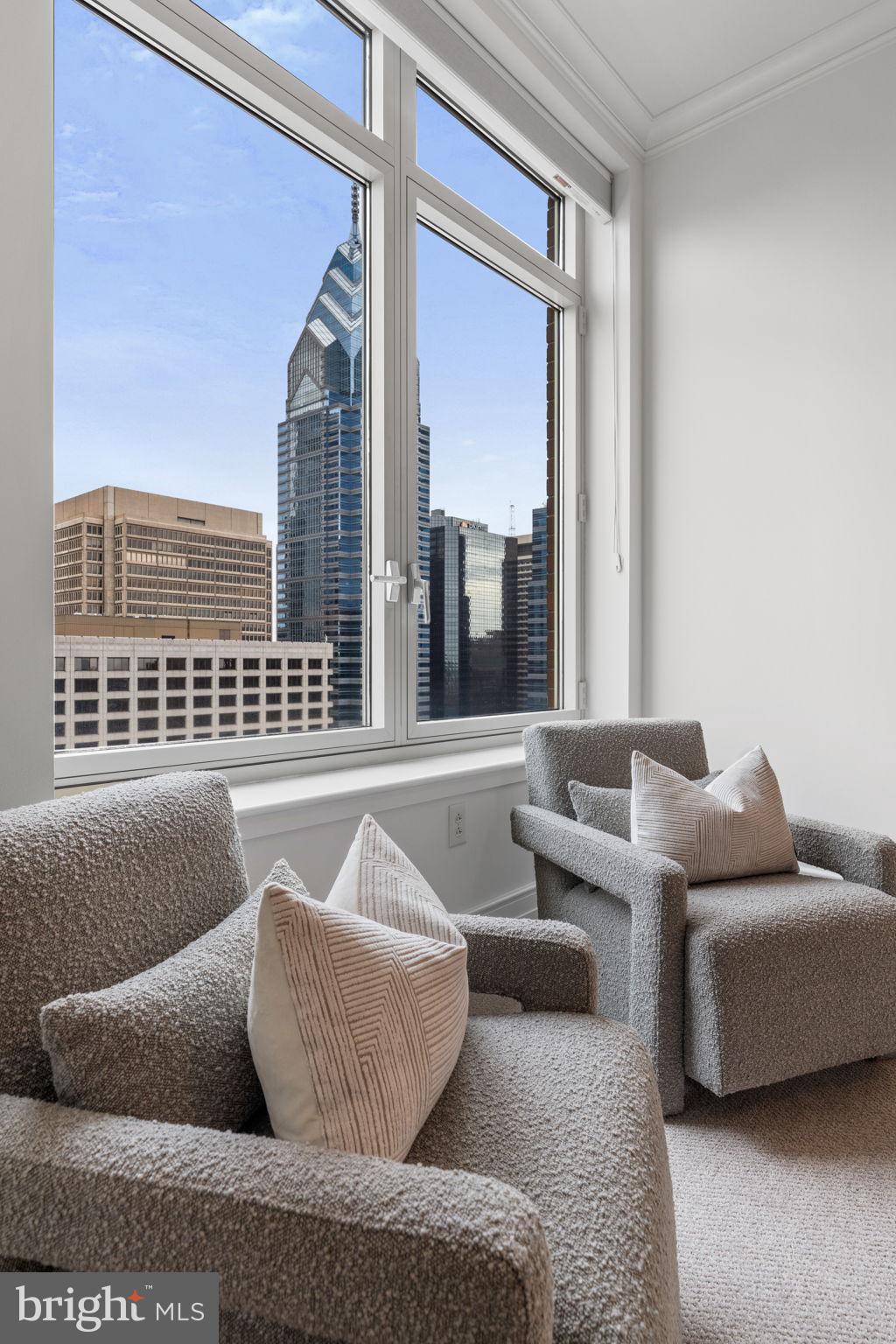 130 South 18th Street, Unit 2502 Philadelphia, PA 19103 - Photo 39 of 76 a living room with furniture and a window