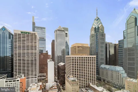 a view of a city with tall buildings