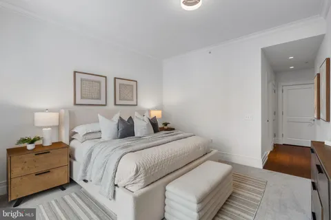 a bathroom with a sink vanity and a mirror