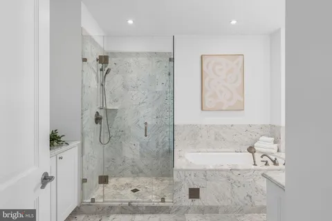 a living room with furniture a lamp and a window