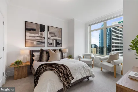 a view of a building with outdoor seating