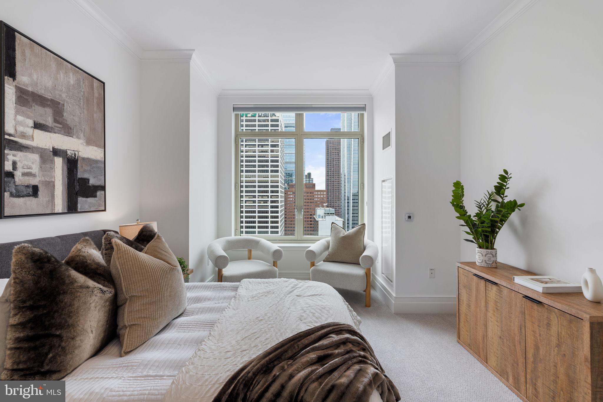 130 South 18th Street, Unit 2502 Philadelphia, PA 19103 - Photo 50 of 76 a bedroom with bed and a window