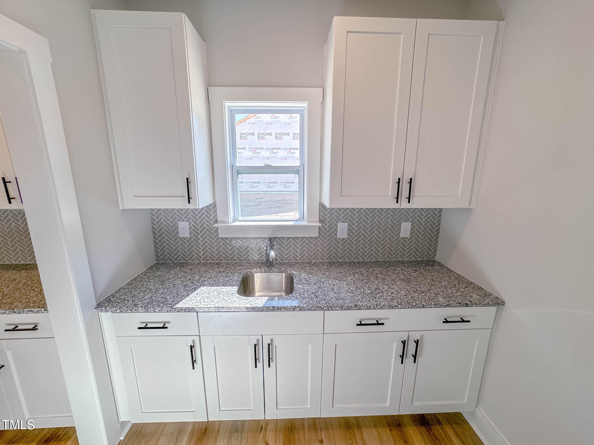 47 Beacon Hl Road, Unit SMITHFIELD Lillington, NC 27546 - Photo 19 of 69 a bathroom with a granite countertop sink and a mirror