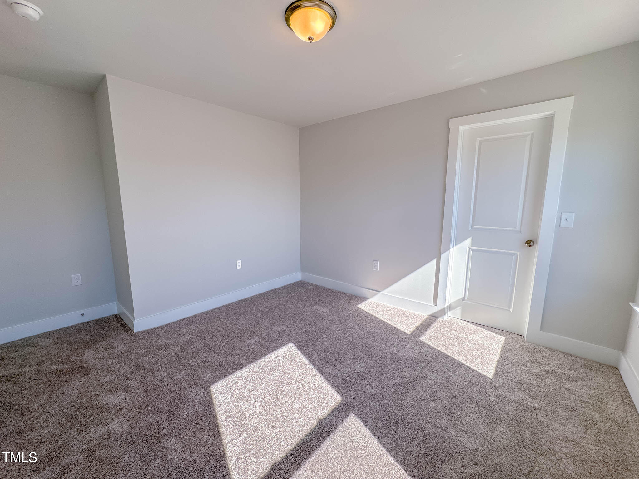 47 Beacon Hl Road, Unit SMITHFIELD Lillington, NC 27546 - Photo 46 of 69 a view of an empty room and window