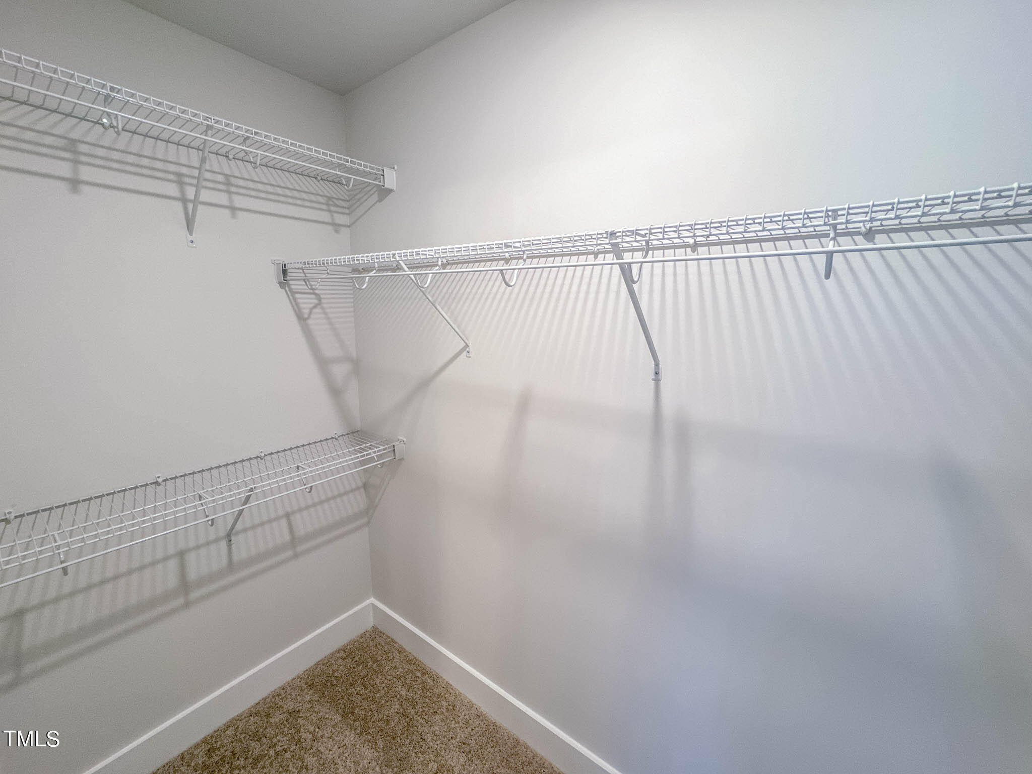47 Beacon Hl Road, Unit SMITHFIELD Lillington, NC 27546 - Photo 66 of 69 a view of walk in closet