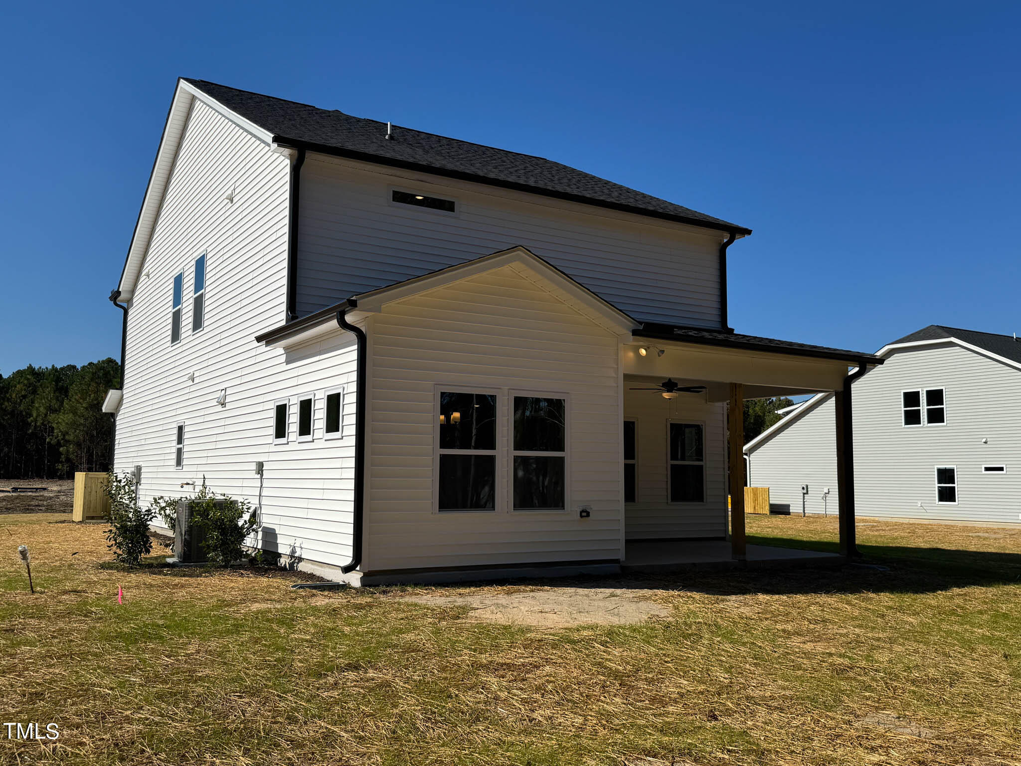 47 Beacon Hl Road, Unit SMITHFIELD Lillington, NC 27546 - Photo 69 of 69 a view of a house with a yard
