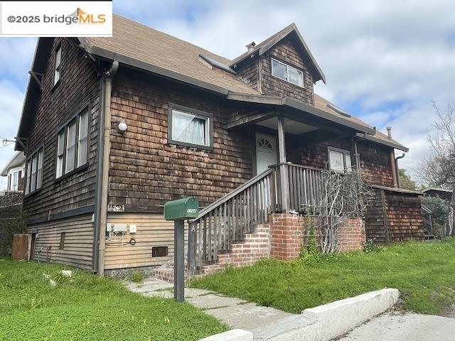 a view of a house with brick walls