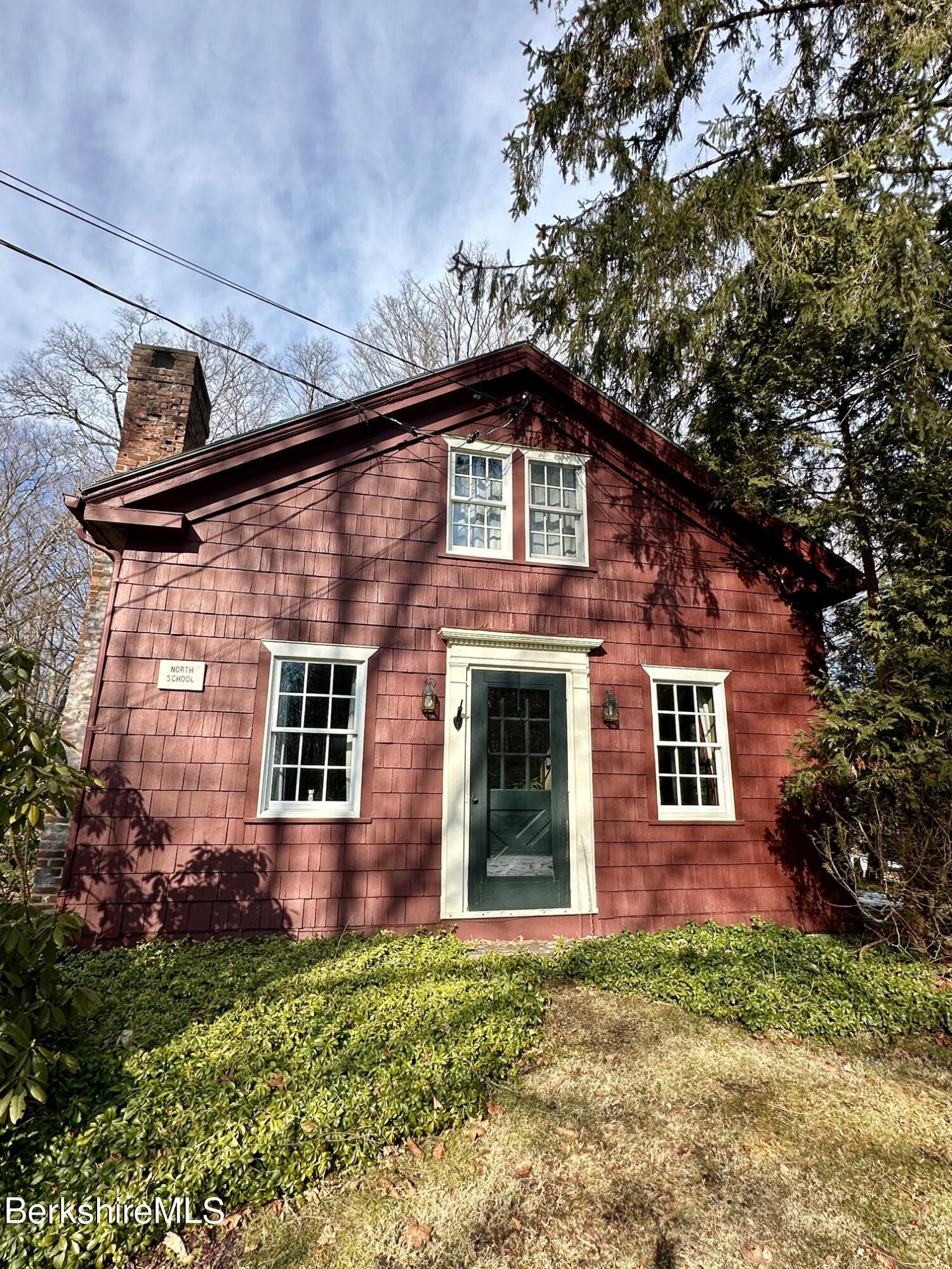 497 Dublin Road Richmond, MA 01201 - Photo 3 of 25 a front view of a house with garden