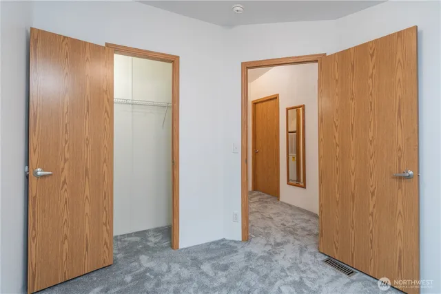 a view of elevator with hallway