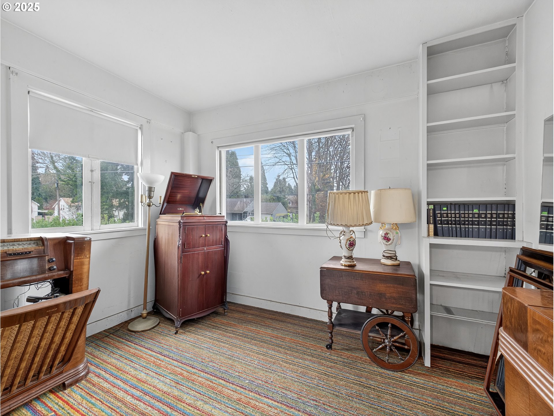18515 Southeast River Road Milwaukie, OR 97267 - Photo 12 of 41 a view of a workspace with furniture and a window