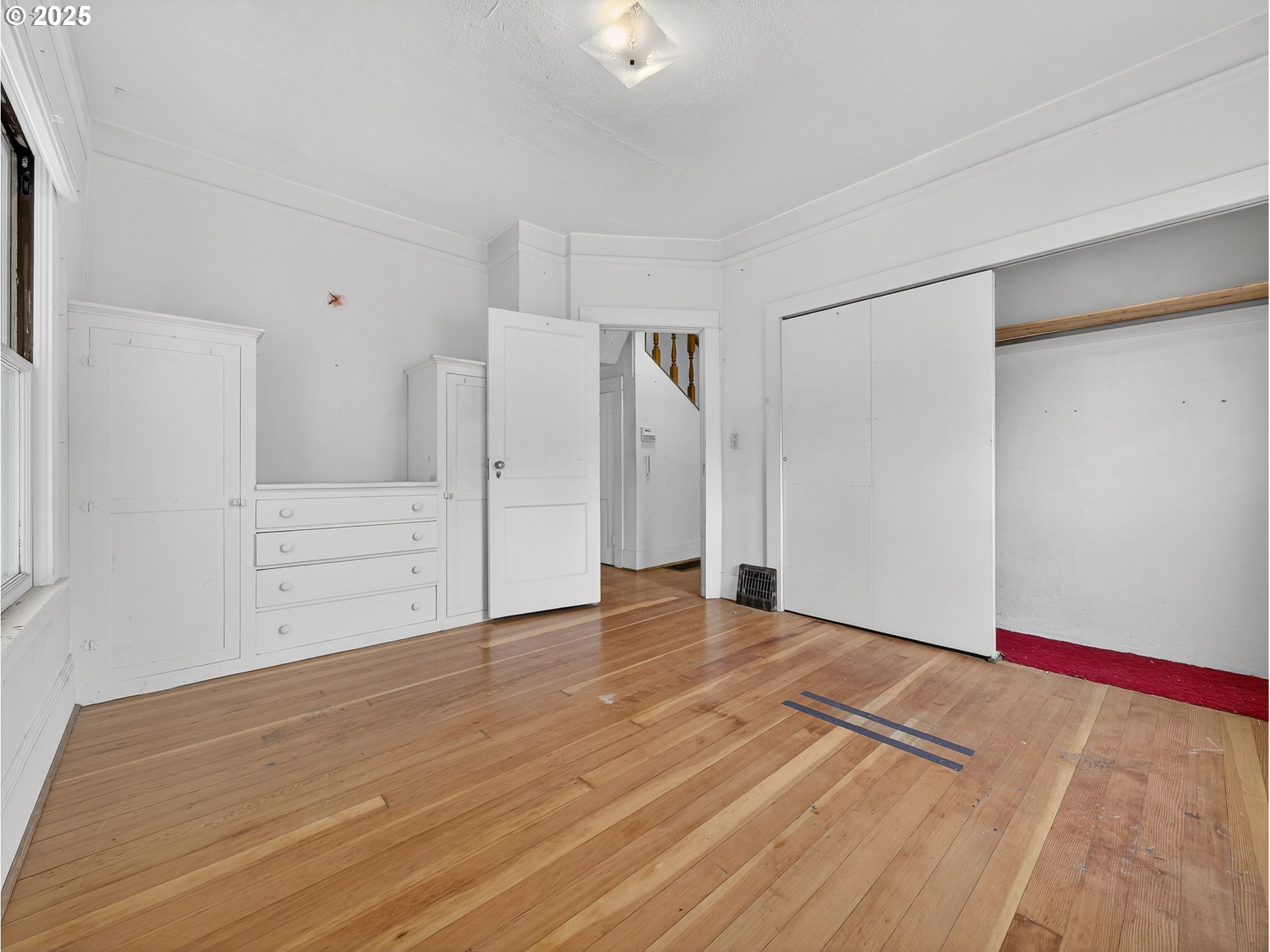 18515 Southeast River Road Milwaukie, OR 97267 - Photo 17 of 41 a view of empty room with wooden floor