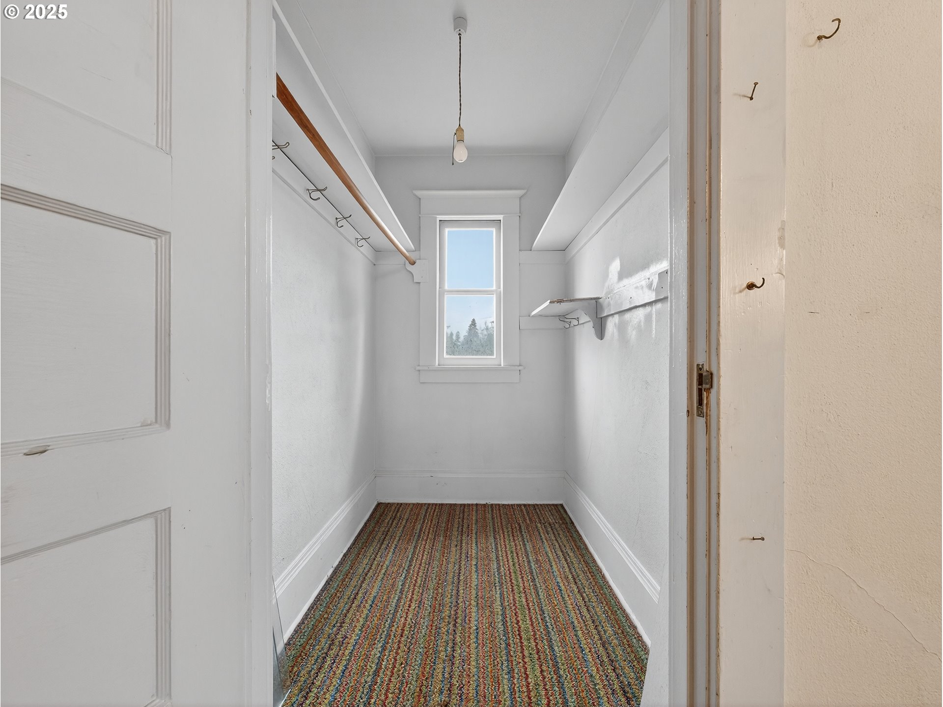 18515 Southeast River Road Milwaukie, OR 97267 - Photo 26 of 41 a view of a hallway with wooden floor and entryway