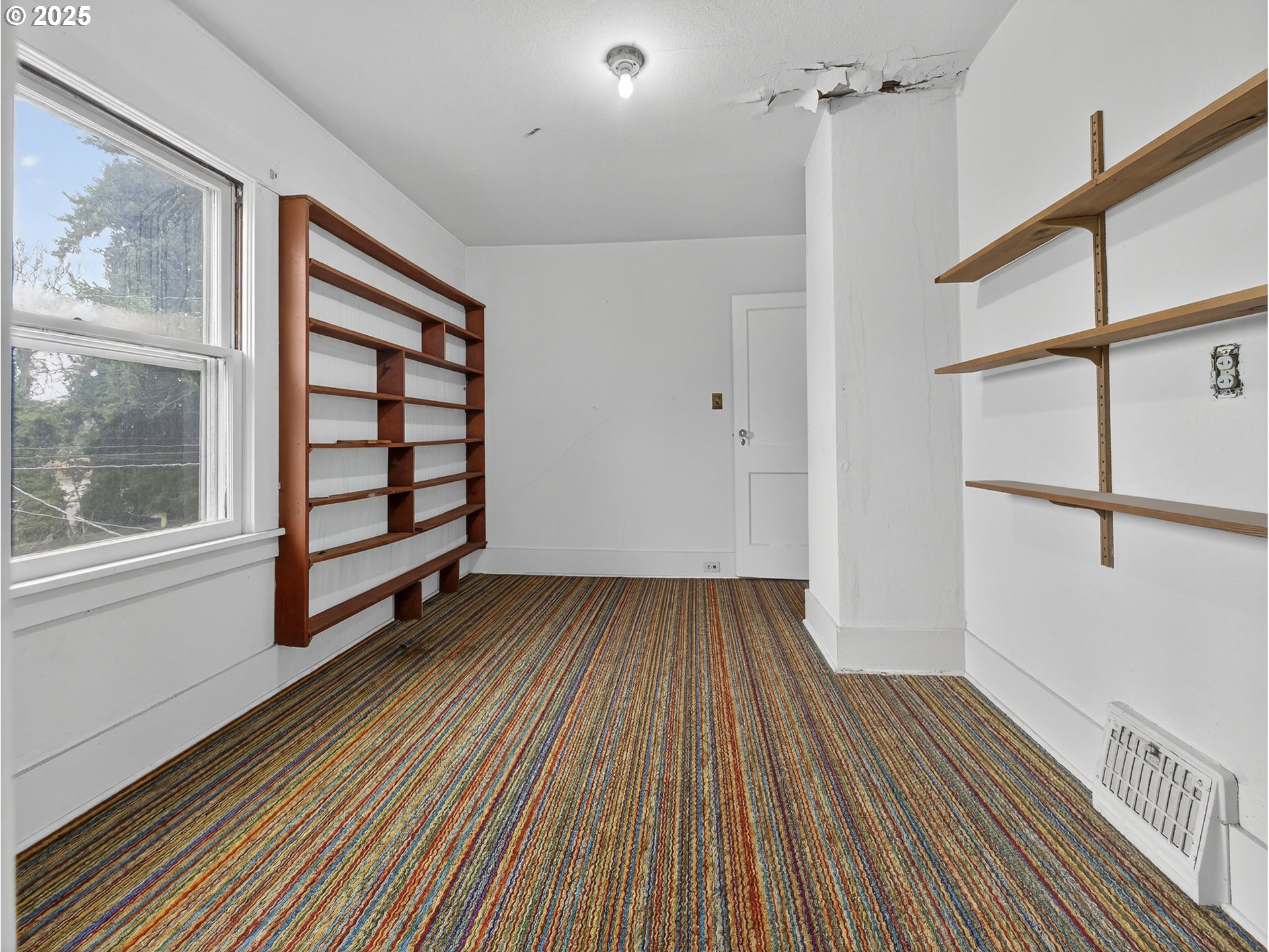 18515 Southeast River Road Milwaukie, OR 97267 - Photo 27 of 41 a view of wooden floor in a room