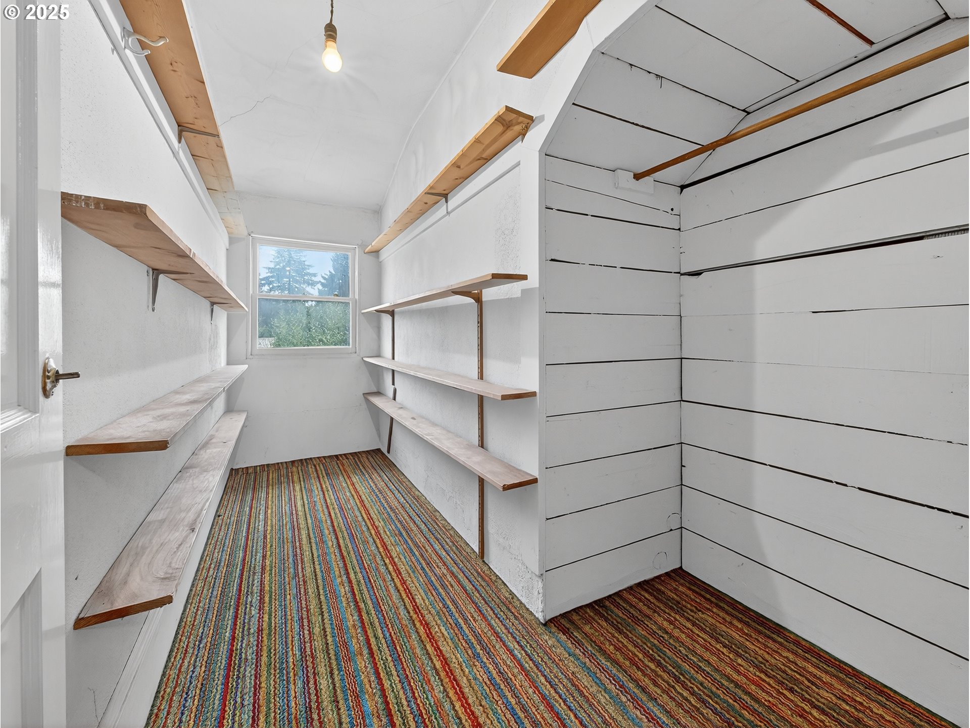 18515 Southeast River Road Milwaukie, OR 97267 - Photo 29 of 41 a view of a room with wooden floor and staircase