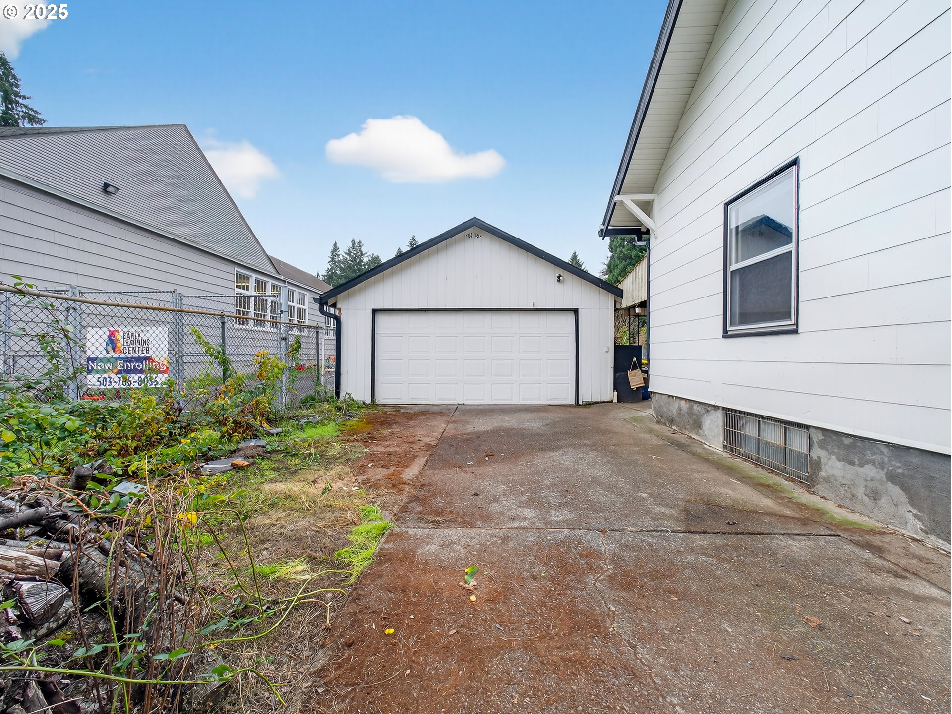 18515 Southeast River Road Milwaukie, OR 97267 - Photo 3 of 41 a view of a house with a yard and garage